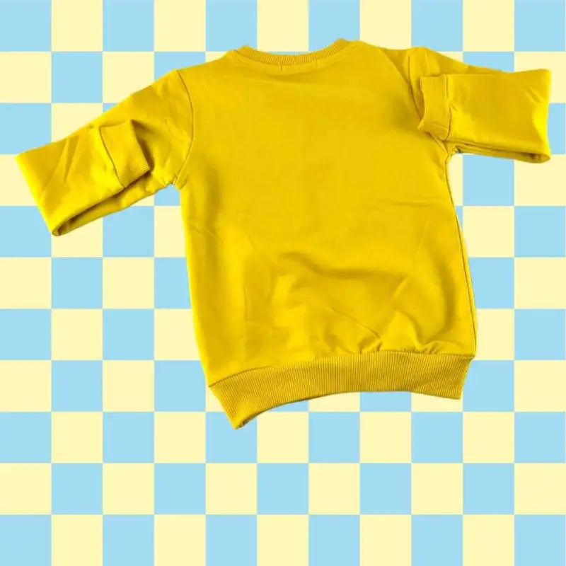 Sarı uzun kollu sweatshirt.
